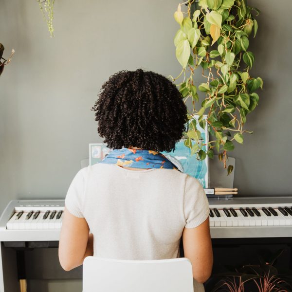 sitting-in-front-of-a-piano-keyboard